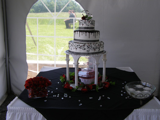 Garden-inspired wedding cake with botanical decorations by Lisa Becker's Bakery